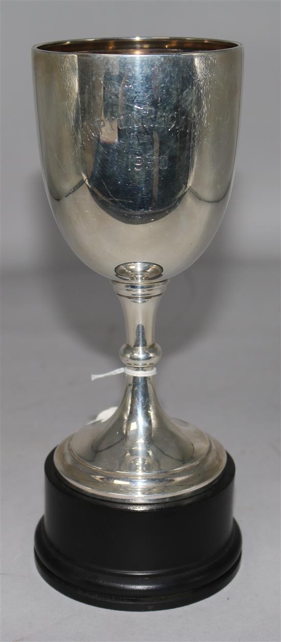 A late 1920s silver trophy cup, on socle, 5 oz.